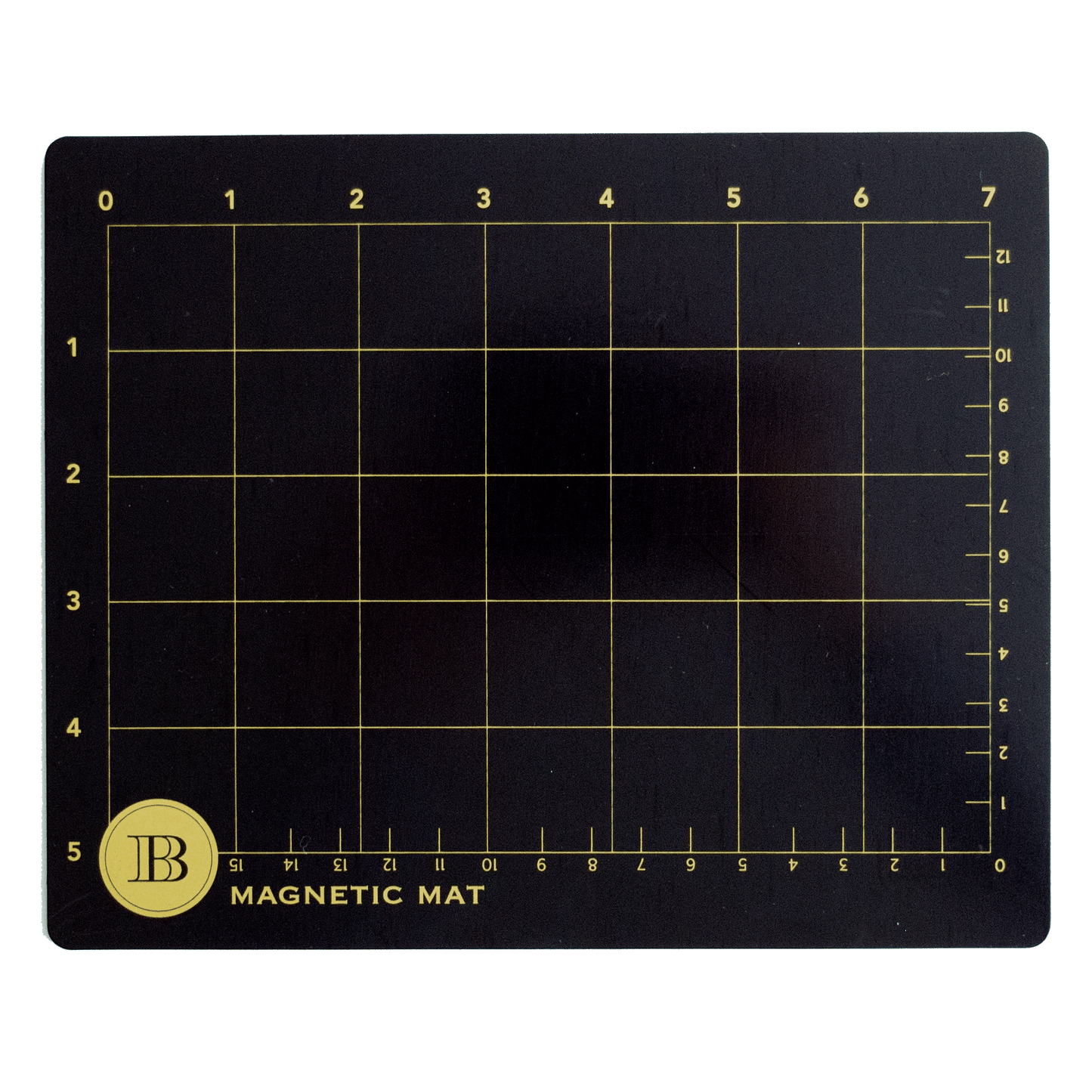 a black and gold magnetic mat with a ruler.