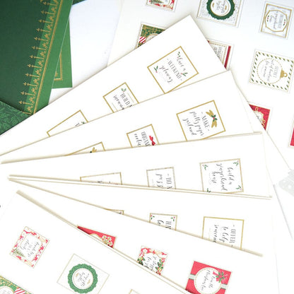 a pile of envelopes with christmas designs on them.