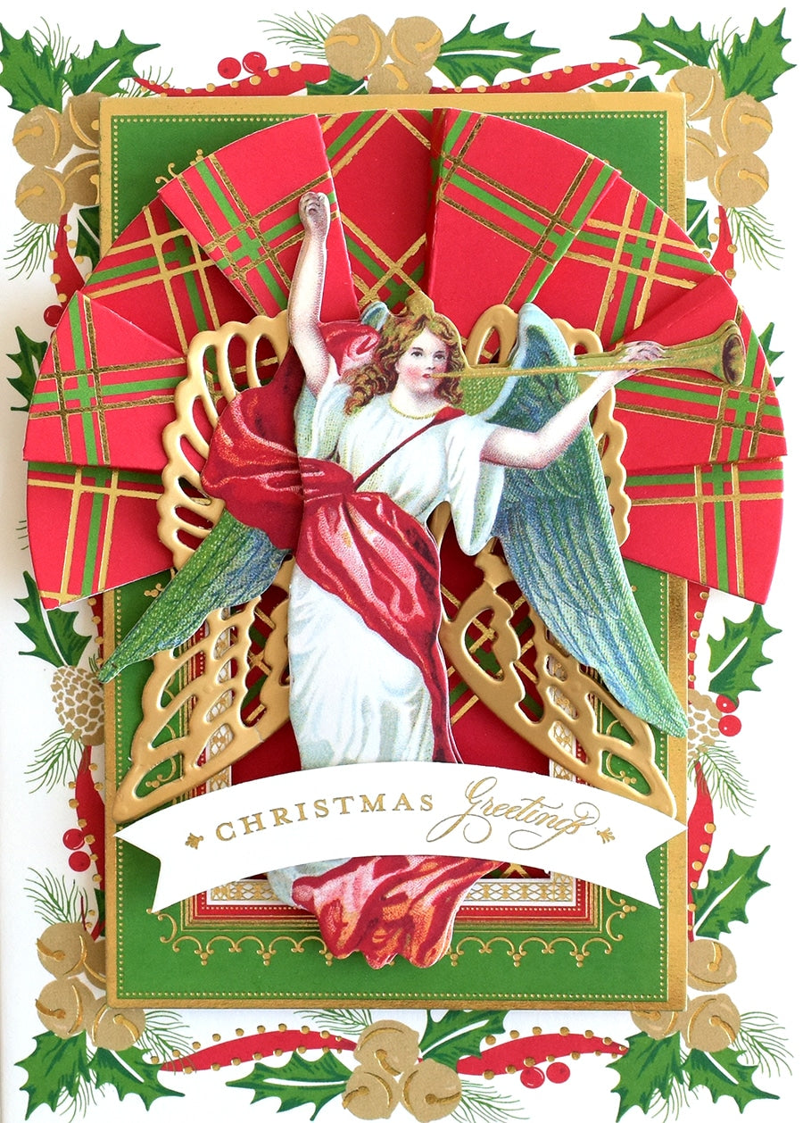 a christmas card with an angel on it.