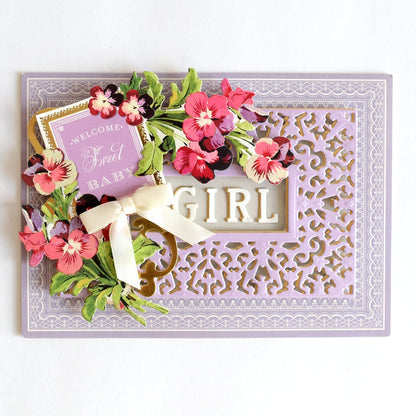 a card with flowers and a bow on it.
