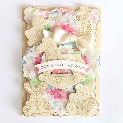 a congratulations card with flowers and a bow.