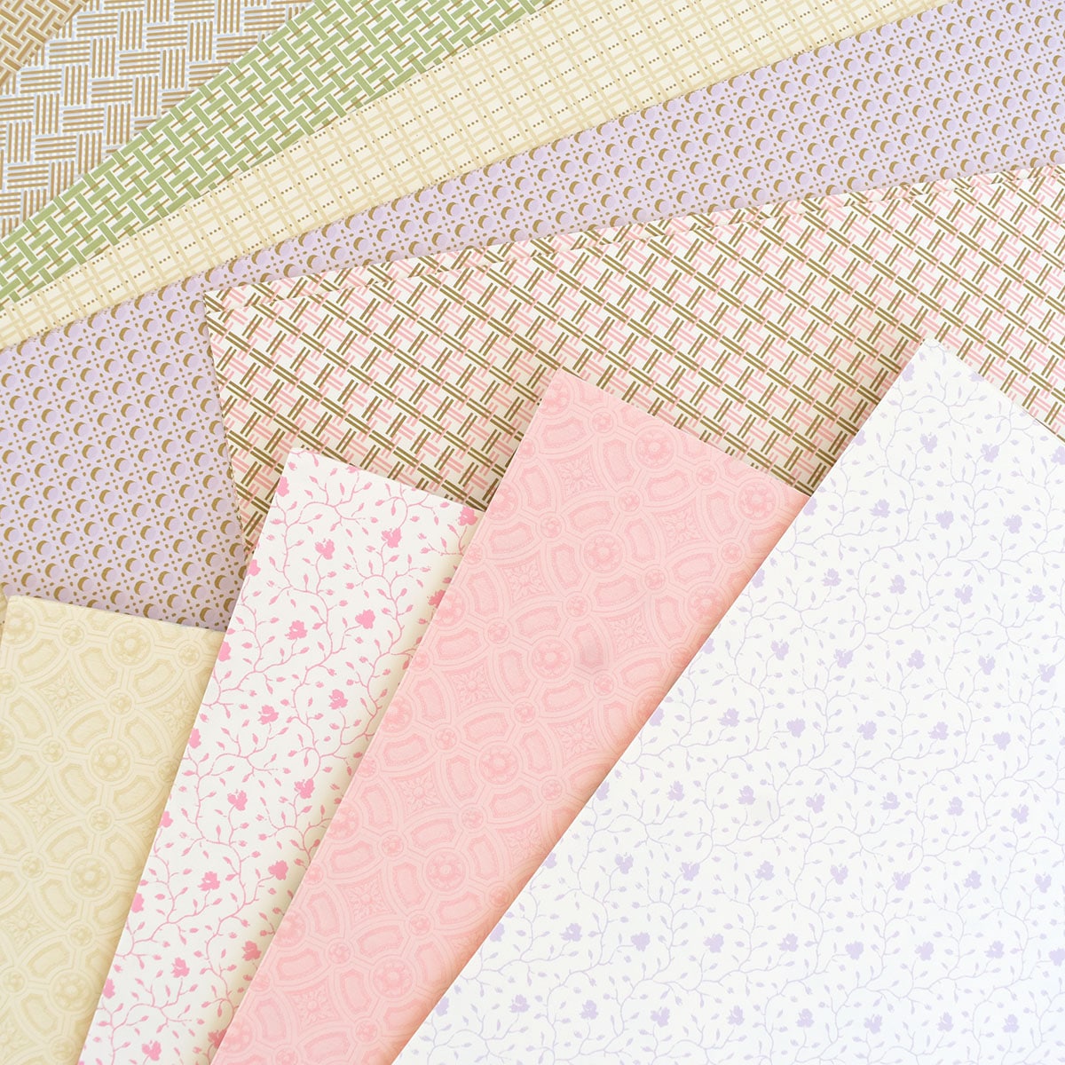 a close up of many different colored papers.