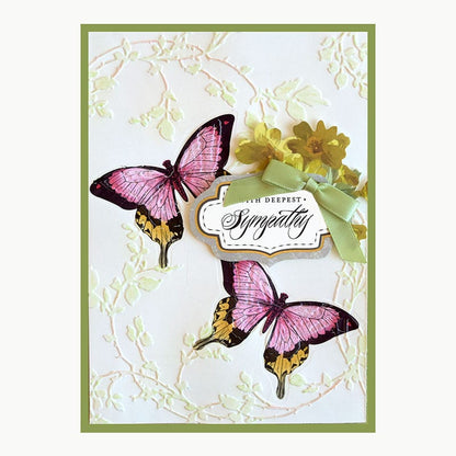 a card with butterflies and flowers on it.