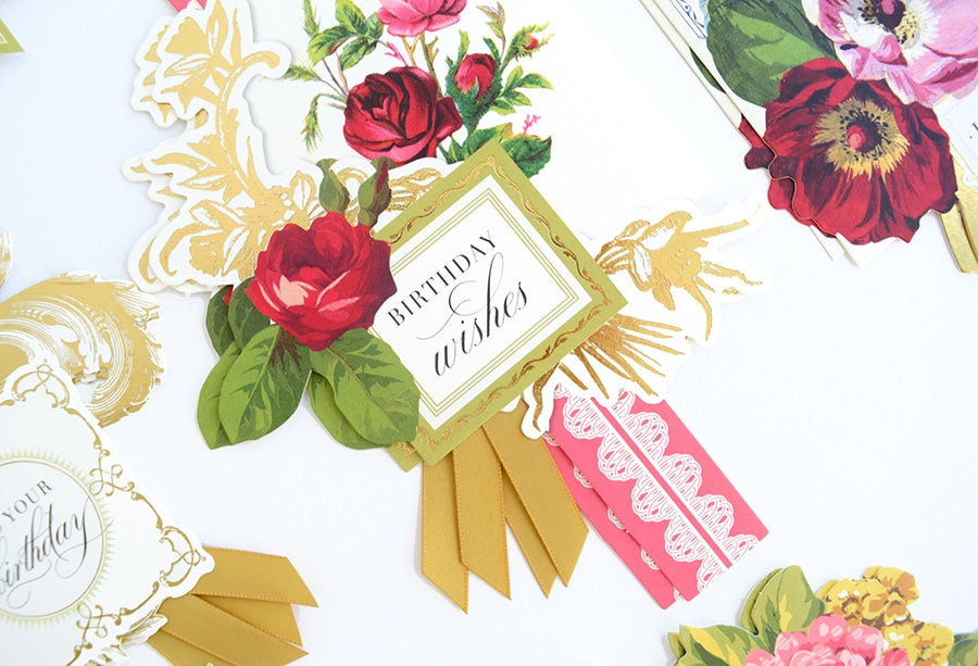 a close up of a birthday card with flowers on it.