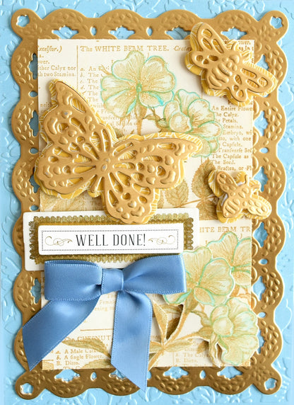 a close up of a card with a blue ribbon.