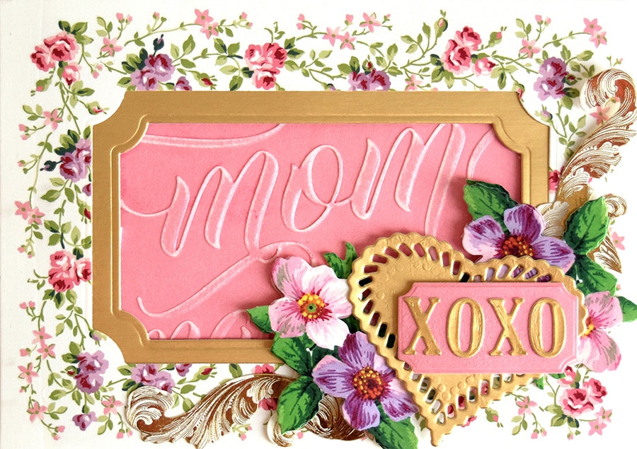 a pink and gold mothers day card with flowers.