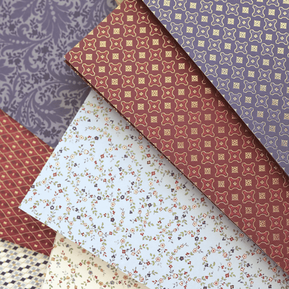 a bunch of different patterns and colors of fabric.