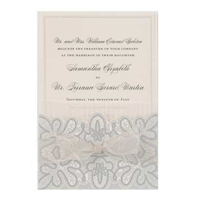 a wedding card with a bow on it.