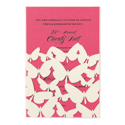 a pink and white wedding card with butterflies.