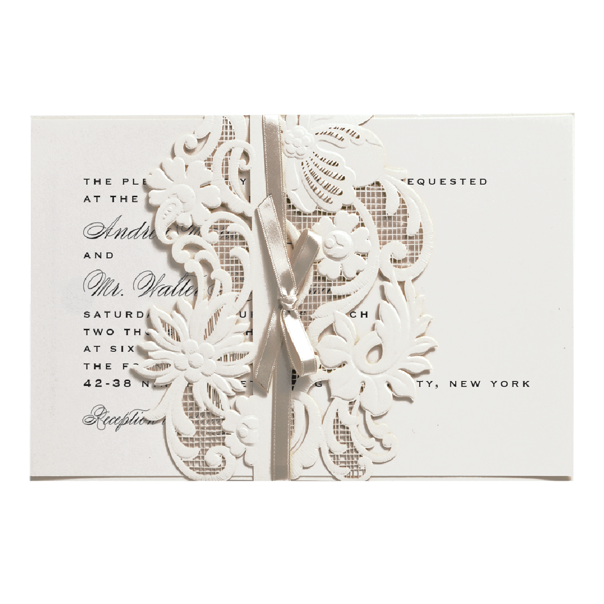 a close up of a wedding card with scissors.
