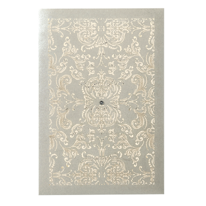 a gray and white rug with a design on it.