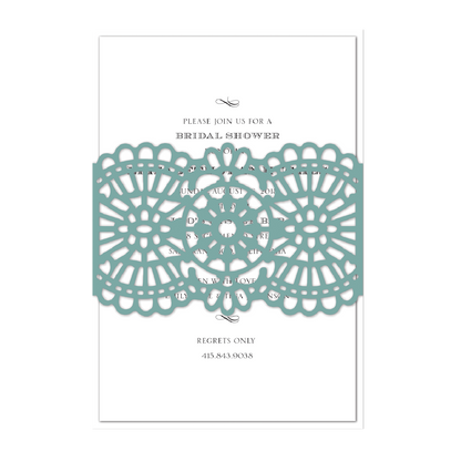a card with a lacy doily design on it.