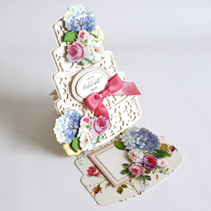 a wedding card holder with flowers on it.
