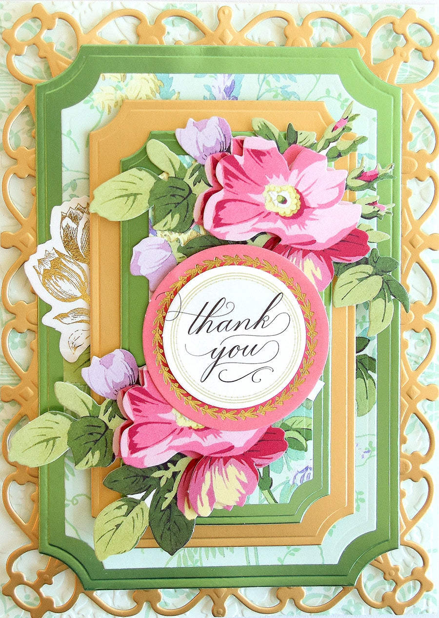 a handmade thank you card with flowers.
