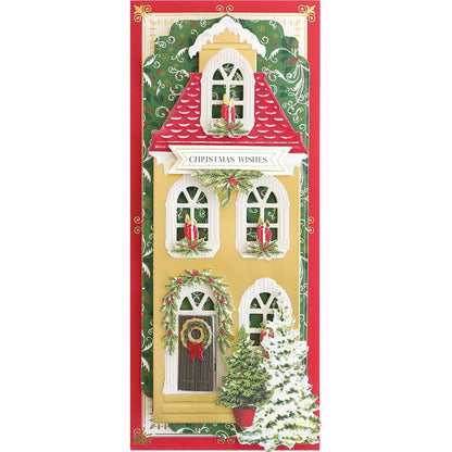 a christmas house card with a red roof.