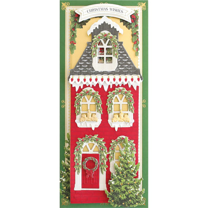 a christmas card with a red and white house.