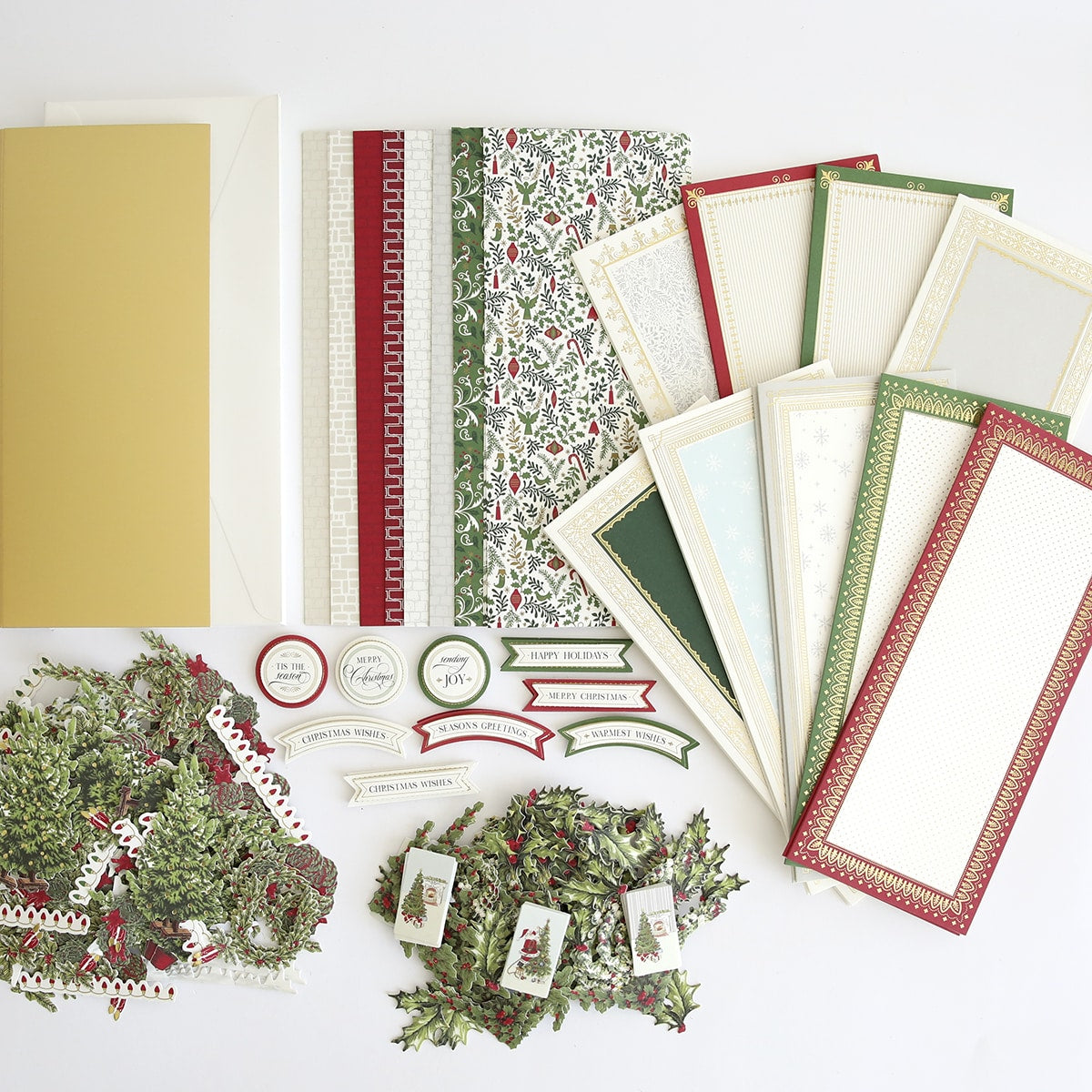 a collection of christmas cards and envelopes.