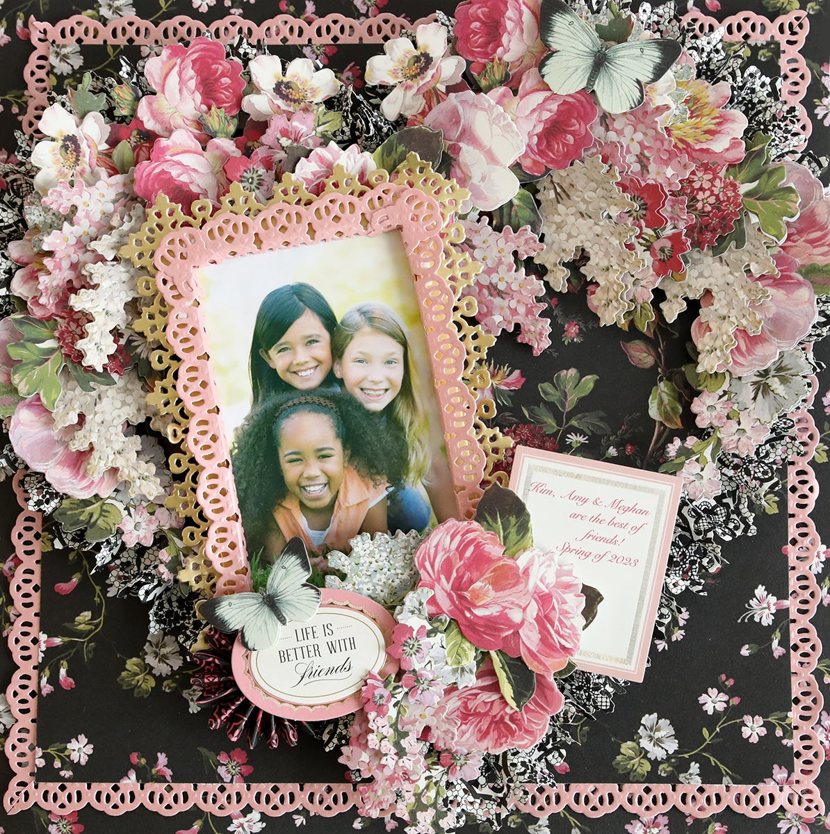 a picture frame with a picture of two girls.