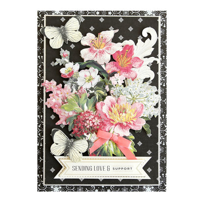 a card with flowers and butterflies on it.