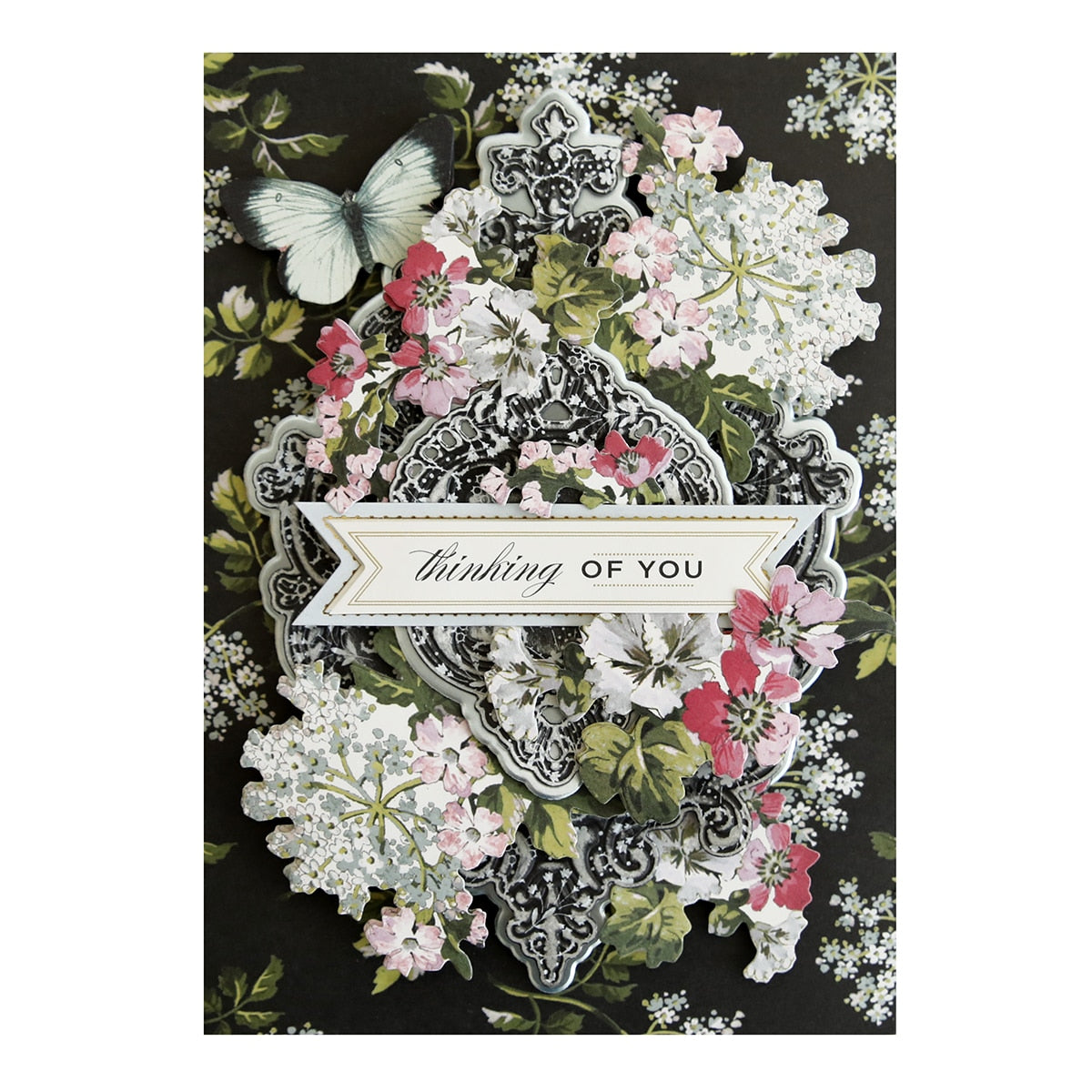 a close up of a greeting card with flowers.