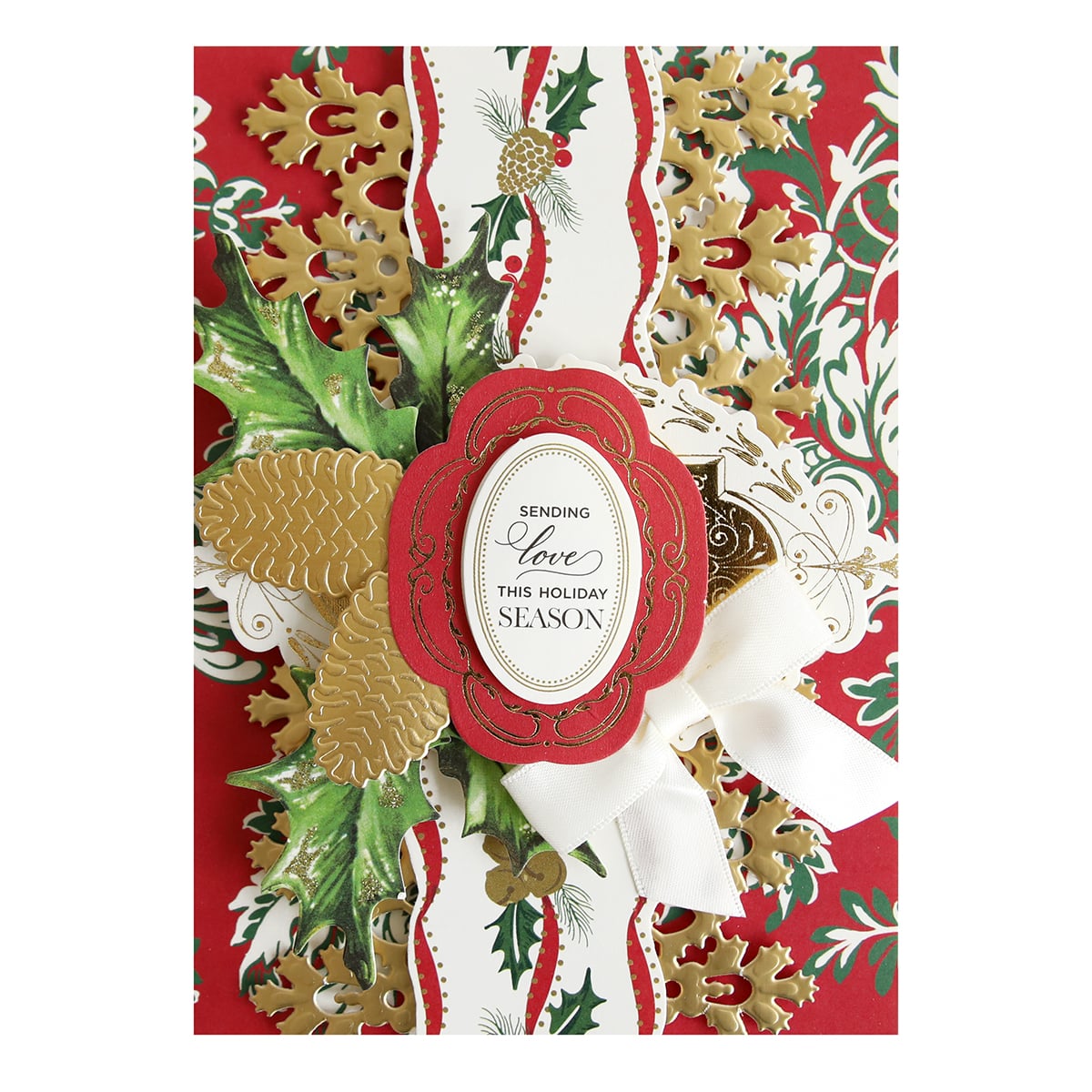 a close up of a christmas card with a ribbon.