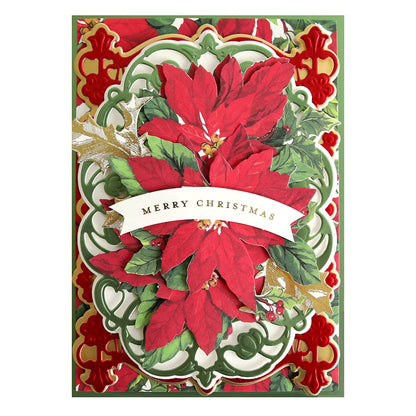 a christmas card with poinsettis and a ribbon.