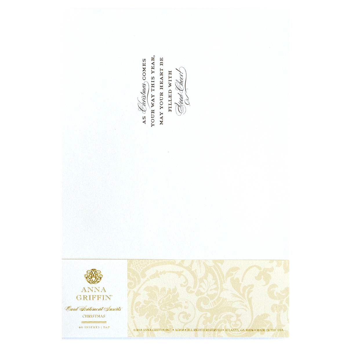 a close up of a white envelope with a gold border.