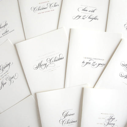 a bunch of white cards with black ink.