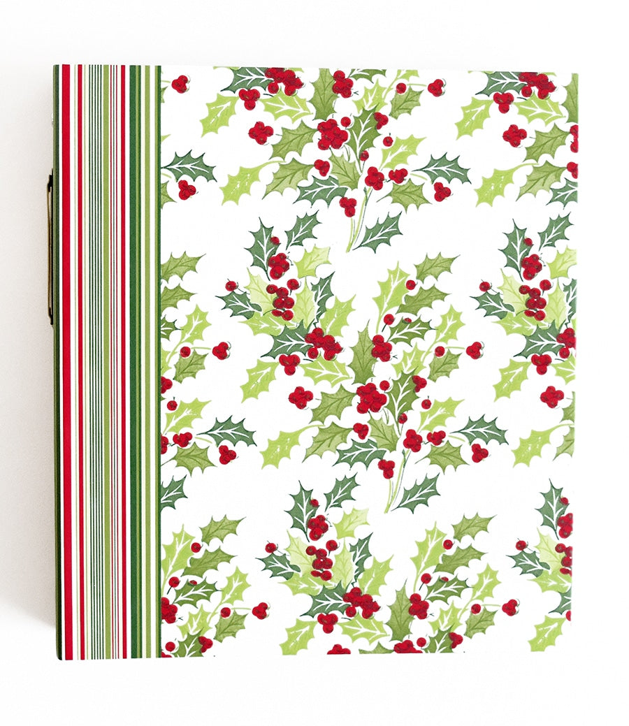 a christmas card with holly and berries on it.