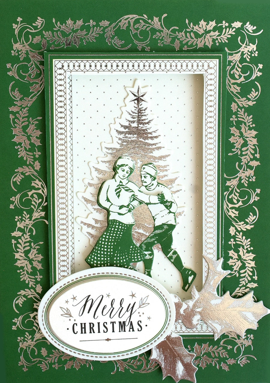 a christmas card with a picture of two people hugging.