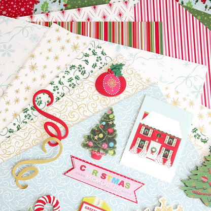 a Christmas Kitsch Papercrafting Collection of christmas cards and papers.