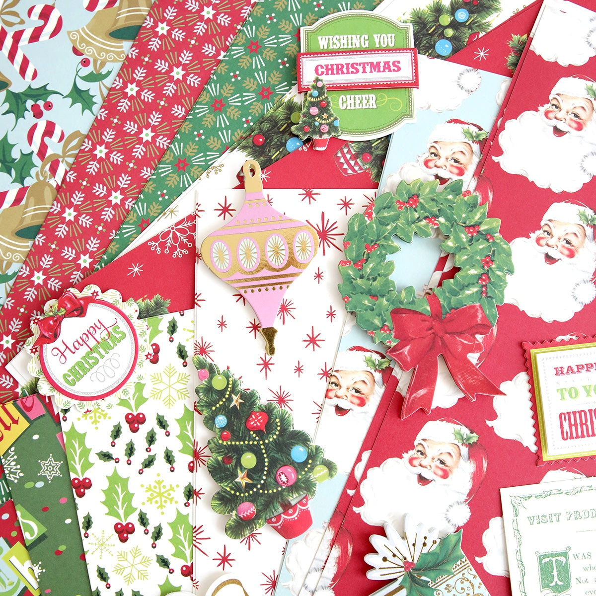 a Christmas Kitsch Papercrafting Collection of christmas cards and papers.