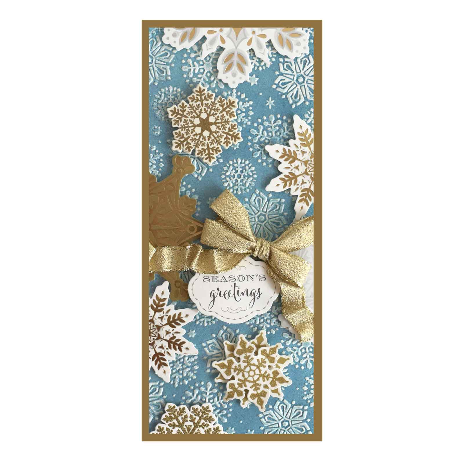 a card with a bow and snowflakes on it.