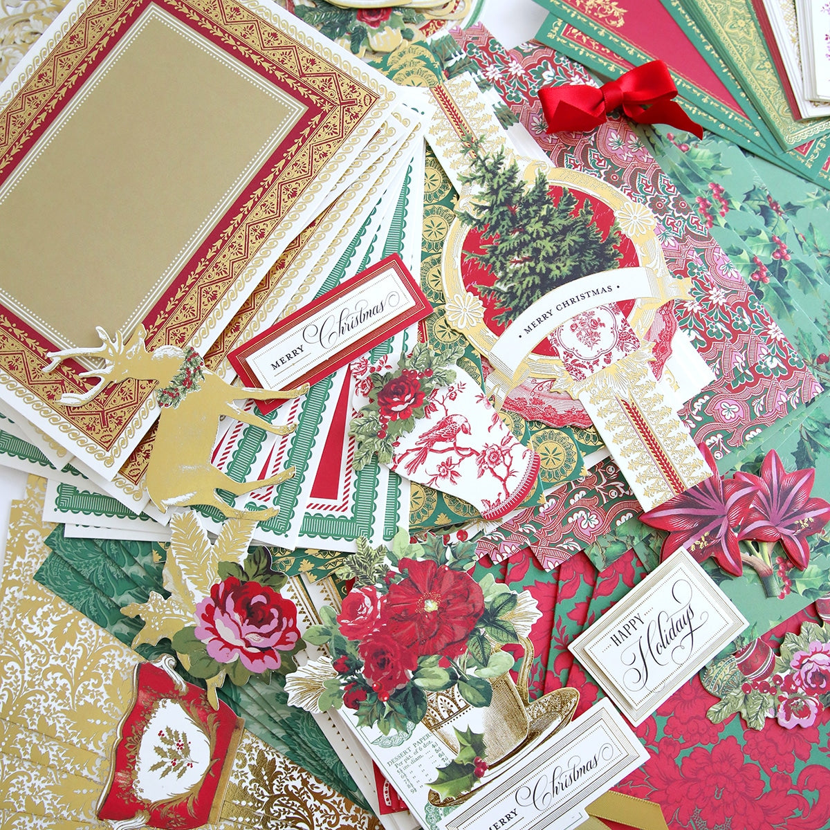 A pile of Christmas Wishes Card Making Kit on a table.