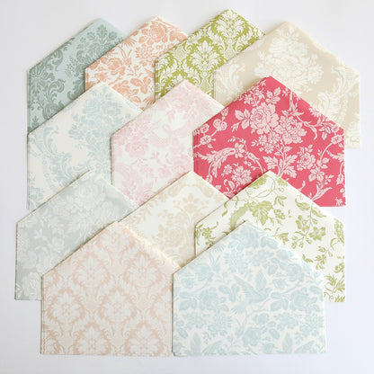 A collection of Damask Envelope Liners with different floral designs.