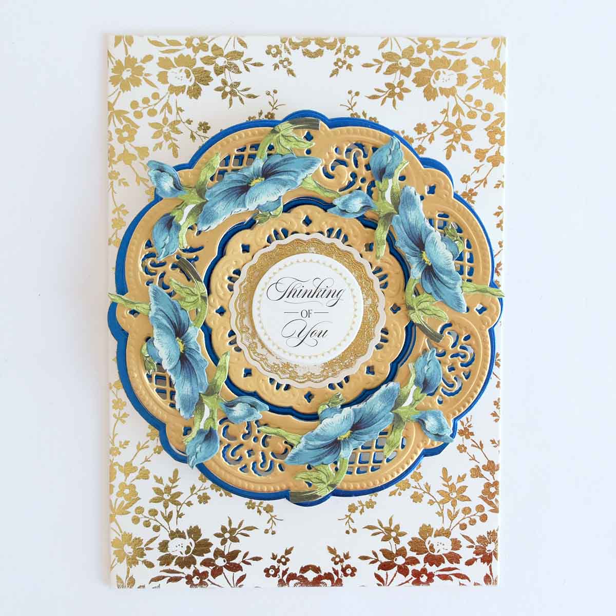 a card with a blue and gold design on it.