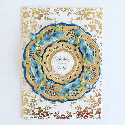 a card with a blue and gold design on it.