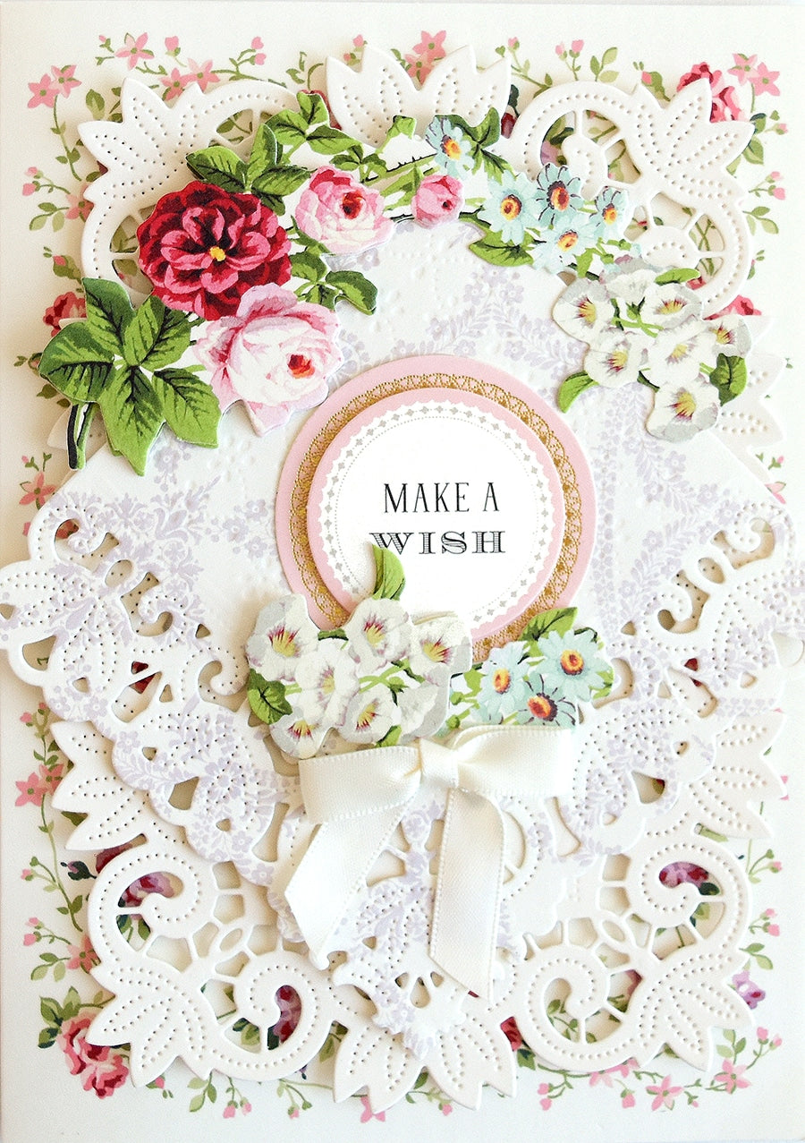 a close up of a card with flowers on it.