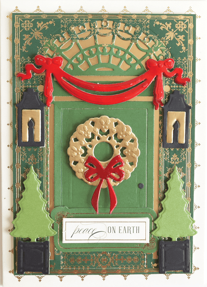 a green card with a red ribbon and a wreath.