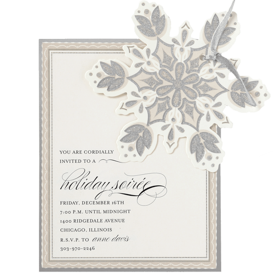 a wedding card with a snowflake design.