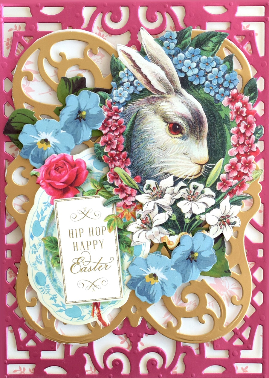 a card with a rabbit and flowers on it.