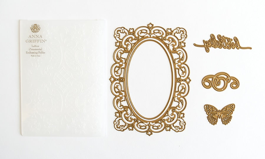 a picture frame with a butterfly and a name on it.