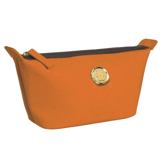a small orange purse with a gold emblem.