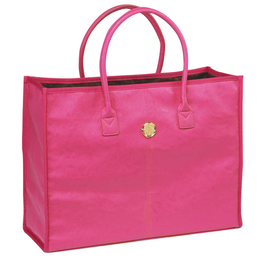 a pink bag with a gold emblem on it.