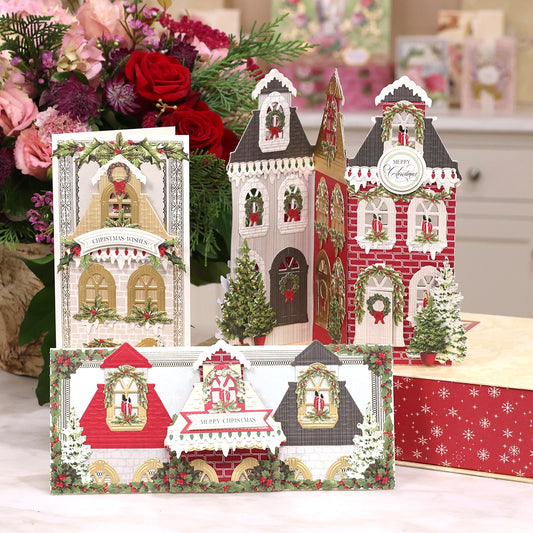 a group of christmas cards sitting on top of a table.