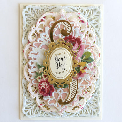 a close up of a card with flowers on it.