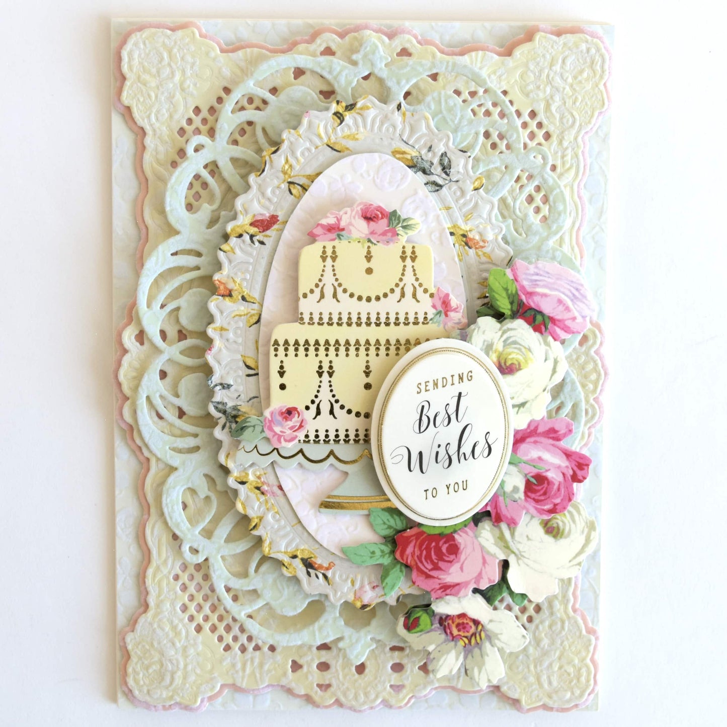 a close up of a card with a doily.
