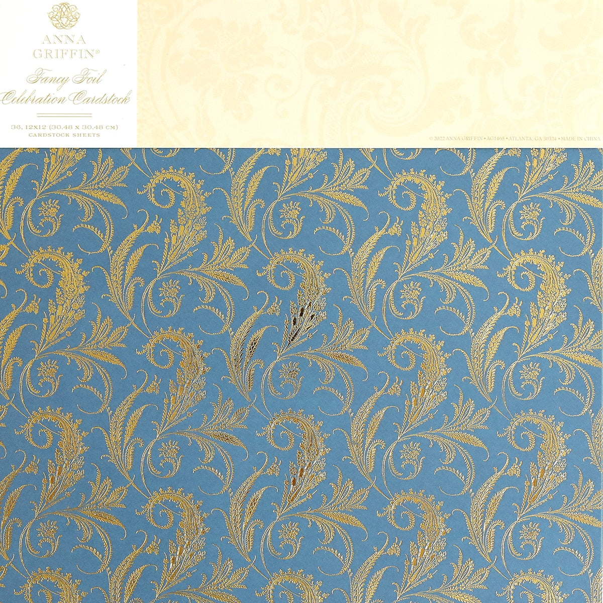 a picture of a blue and gold wall paper.