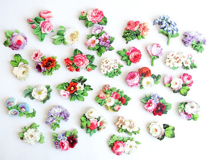 a bunch of flowers that are on a table.