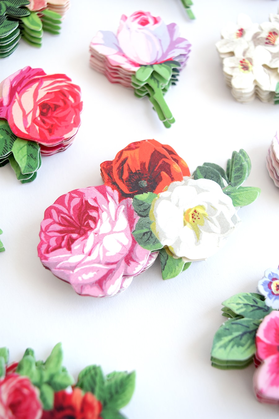 a close up of a bunch of flowers on a table.